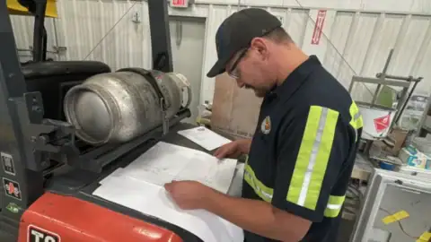 PWI Installer Reviewing Stair Drawings