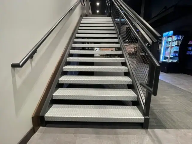 Wide straight stairs in building